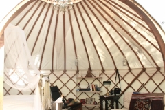 Wedding night yurt with art deco bed from Roundhouse Yurts