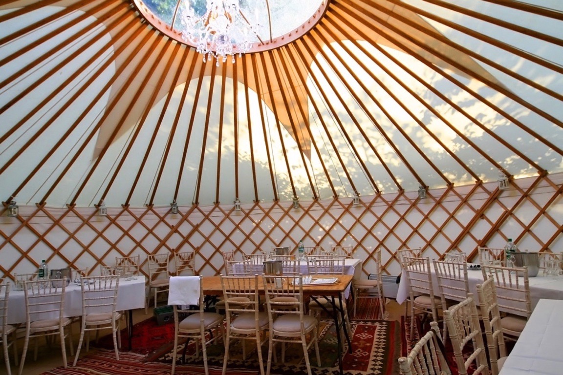 Limewashed chairs @ Roundhouse Yurts Luxury Interior Dining Package for a hired Roundhouse Yurt.
