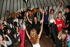 A party inside of a hired Roundhouse Yurt.