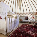 A Roundhouse Yurt with a stylish wedding night interior.