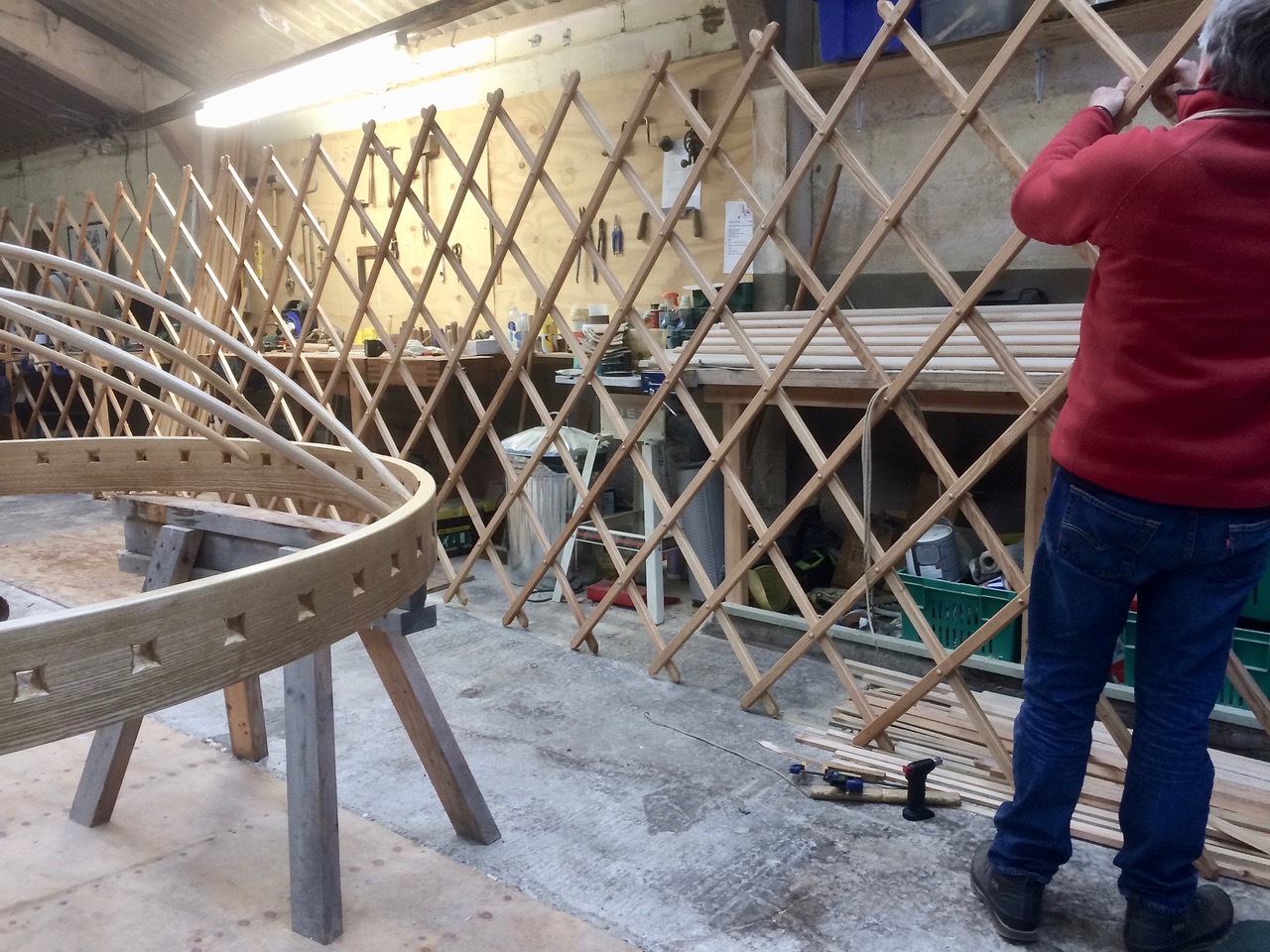 Jeremy knotting trellis wheel in foreground